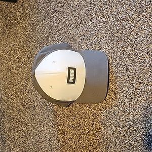 White and gray golf hat